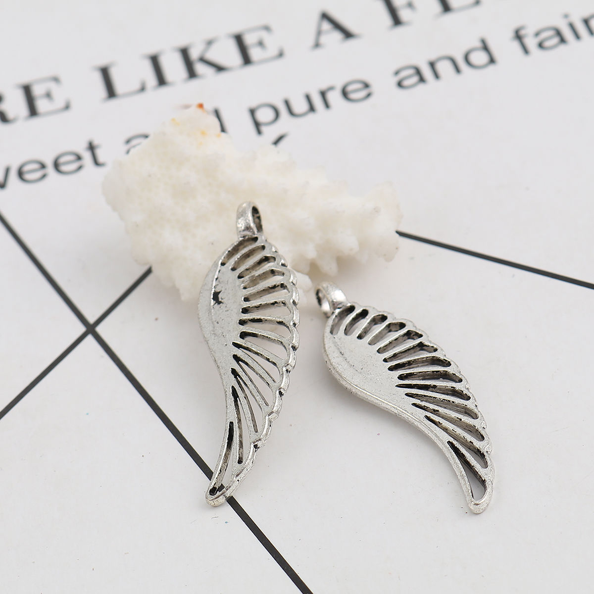 Picture of Zinc Based Alloy Pendants Feather Antique Silver Color 44mm(1 6/8") x 14mm( 4/8"), 20 PCs