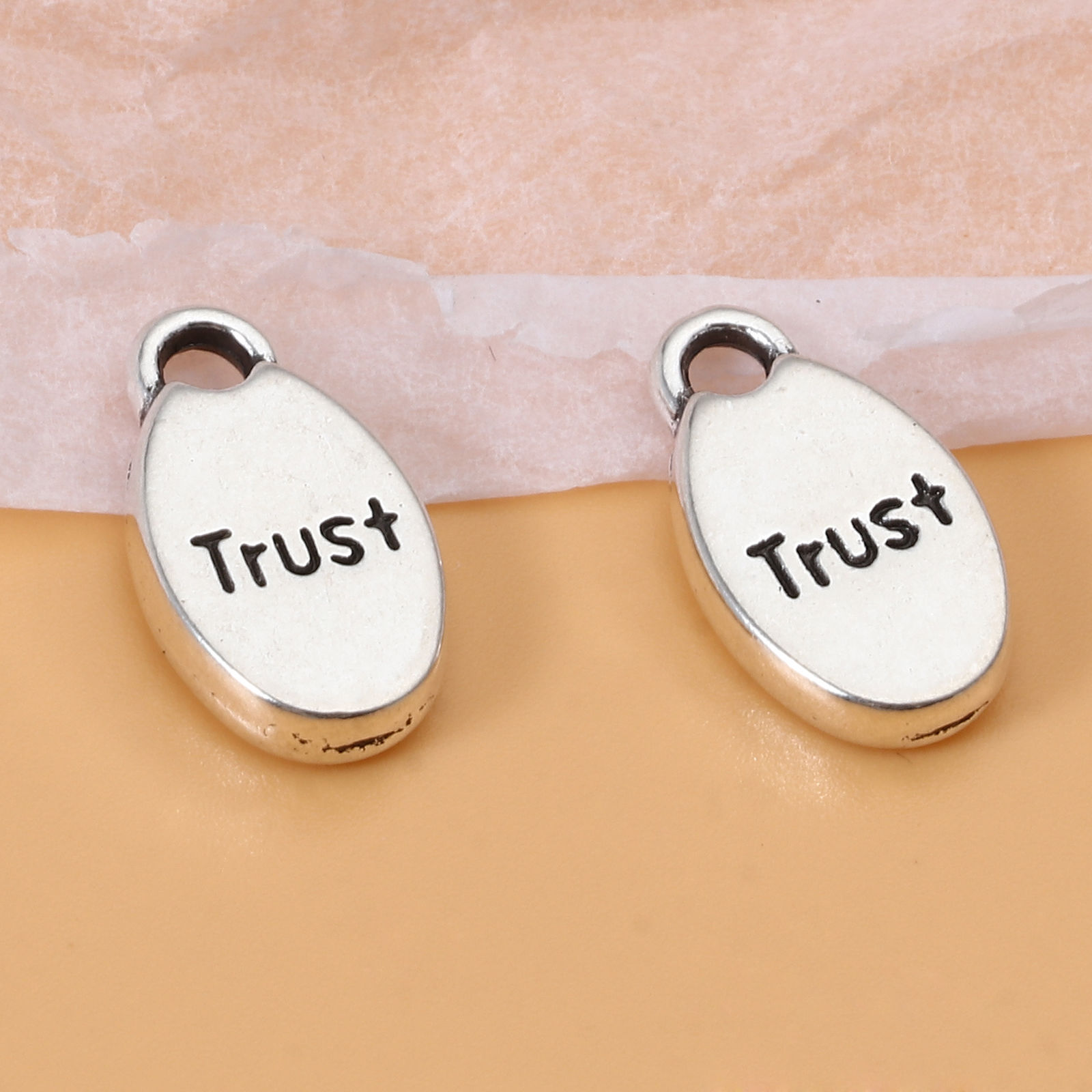 Picture of Zinc Based Alloy Charms Oval Antique Silver Color Message " Trust " 15mm x 9mm, 50 PCs