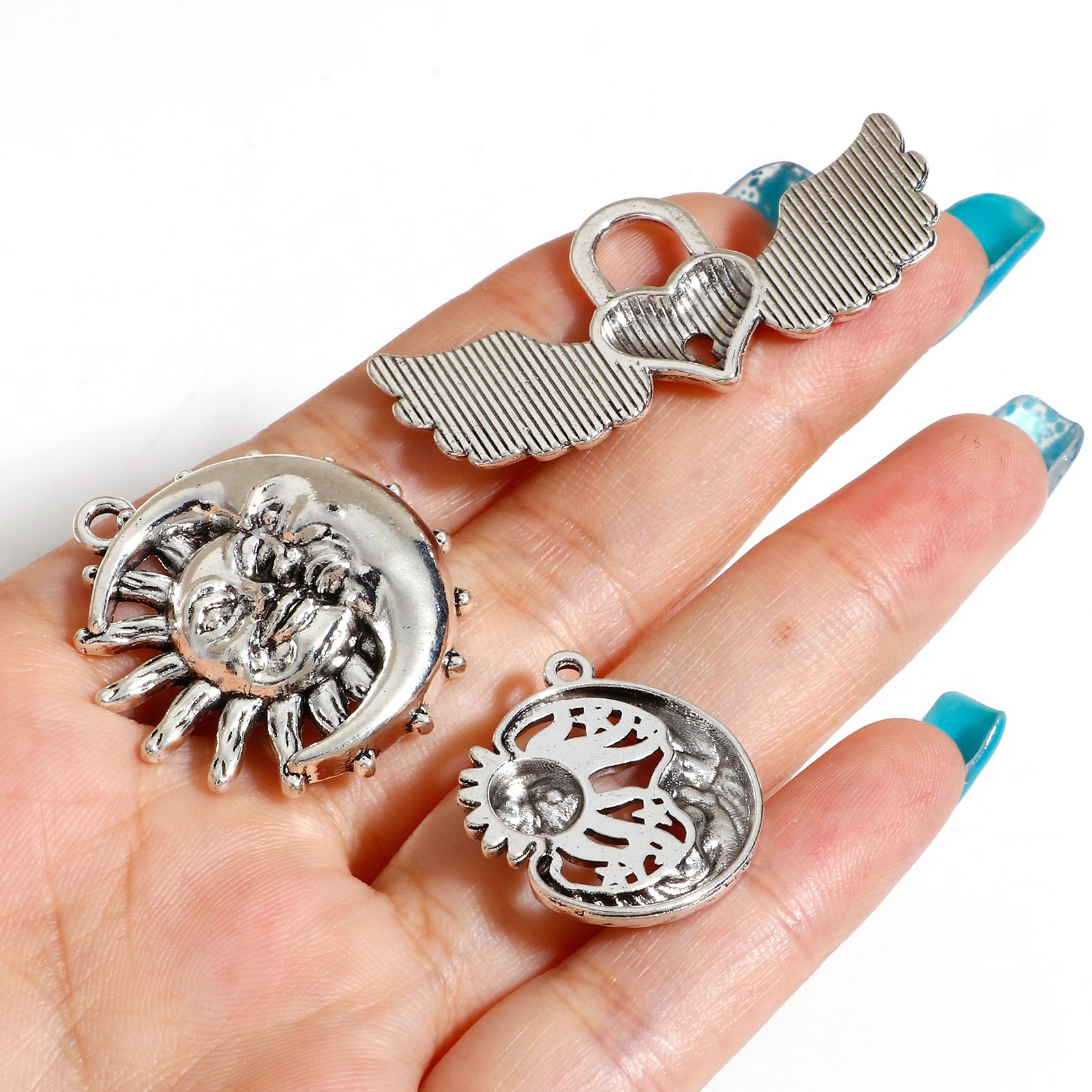 Picture of Zinc Based Alloy Pendants Antique Silver Color Wing Sun And Moon Face