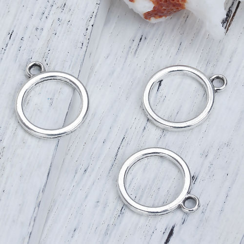 Picture of 10 PCs Zinc Based Alloy Geometric Bezel Frame Charms Pendants Antique Silver Color Round Hollow 19mm x 16mm