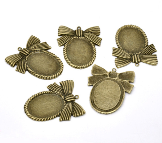 Picture of Zinc Based Alloy Cabochon Setting Pendants Oval Bowknot Antique Bronze (Fits 29mm x 21.5mm) 4.6cm x 3.9cm, 2 PCs