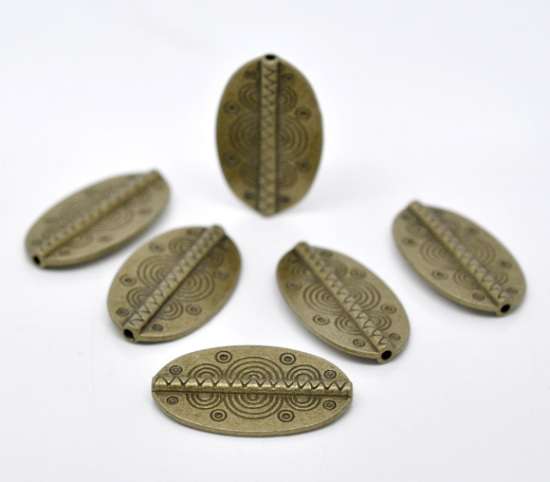 Bild von Zinklegierung Spacer Perlen Zwischenperlen Oval Bronzefarbe Muster Geschnitzt ca. 37mm x 22mm, Loch:ca. 2mm, 10 Stück