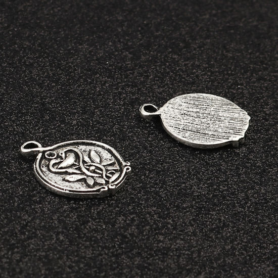 Bild von Zinklegierung Charms Rund Antiksilber (für ss5 Spitzboden Strasssteine) Schwan 24mm x 19mm, 10 Stück