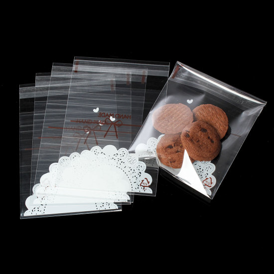 Изображение OPP Сумка  для продуктов питания безопасные Белый Бант  С Узором " Hand Made " Самослипание 13.5см x 10см, 1 Пакет (около 100  шт/уп )