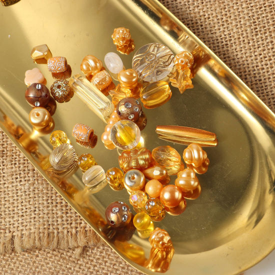 Bild von Acryl Perlen Zufällig mix Goldenbraun ca. 6mm D., ca. 39mm x 27mm, Loch:ca. 7.2mm-1.1mm, 100 Gramm