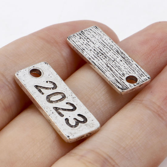 Picture of Zinc Based Alloy Year Charms Antique Silver Color Rectangle Number Message " 2023 " 21mm x 9mm, 20 PCs