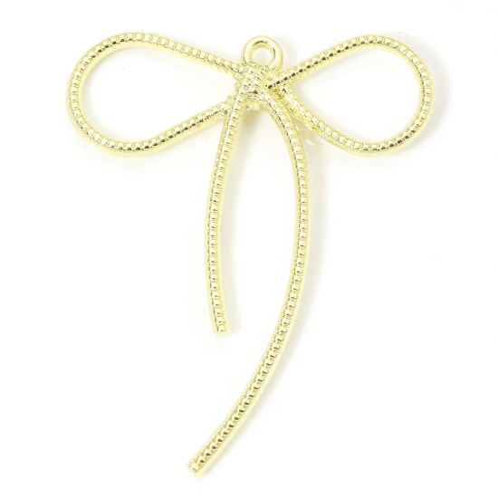 Picture of 10 PCs Zinc Based Alloy Clothes Pendants Gold Plated Bowknot Hollow 4.4cm x 3.6cm