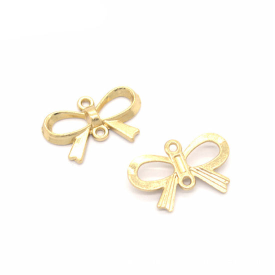 Picture of 50 PCs Zinc Based Alloy Clothes Connectors Charms Pendants KC Gold Plated Bowknot Hollow 22mm x 15mm