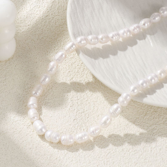 Immagine di 1 Filo (Circa 32 Pz/Treccia) Naturale Perla Barocco Perline per la Creazione di Gioielli con Fai-da-te Ovale Bianco Circa 10mm x 8mm, Foro: Circa 0.5mm, Lunghezza: 33cm