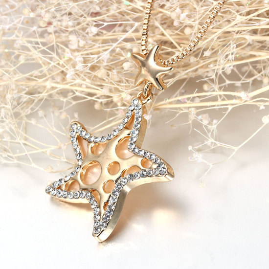 Image de Collier Etoile de Mer Doré à Strass Rose Orange Transparent 41cm long, 1 Pièce