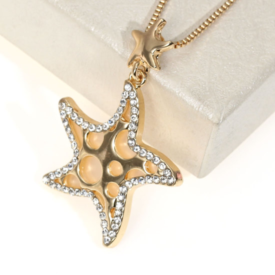 Image de Collier Etoile de Mer Doré à Strass Rose Orange Transparent 41cm long, 1 Pièce