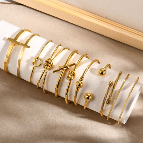 Bild von Umweltfreundliche Vakuumbeschichtung Stilvoll Einfach 18K Gold plattiert 304 Edelstahl Knoten Kreuz Offen Armband Für Frauen Party 1 Stück